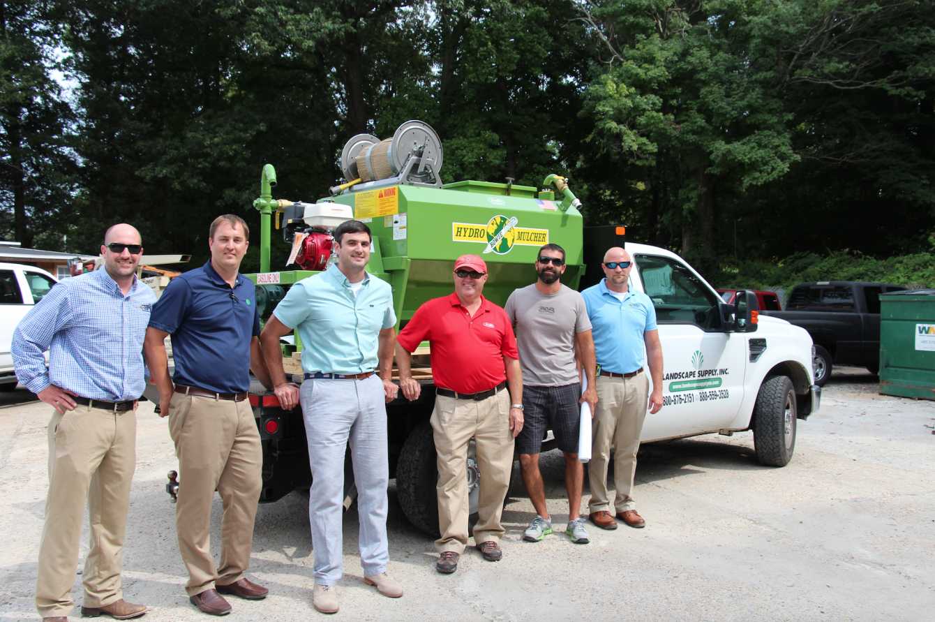 Staff of Erosion Control Services and Landscape Supply are pictured with Profile Products' Regional Sales Manager and their prize.
