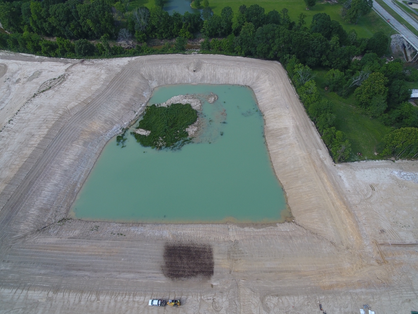 An aerial view showing the scope of the project. Based on the poor soil conditions and the slopes, Grass Master applied ProGanics DUAL to the site. Photo courtesy of Earth & Turf Reps